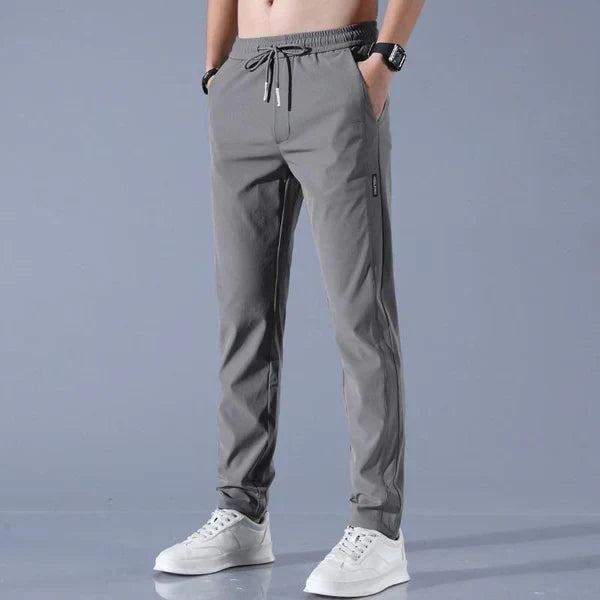 New🔥 Buy 1 Get 1 Free • Premium Men’s High-Stretch Skinny Lycra Track Pants (Black & Grey)