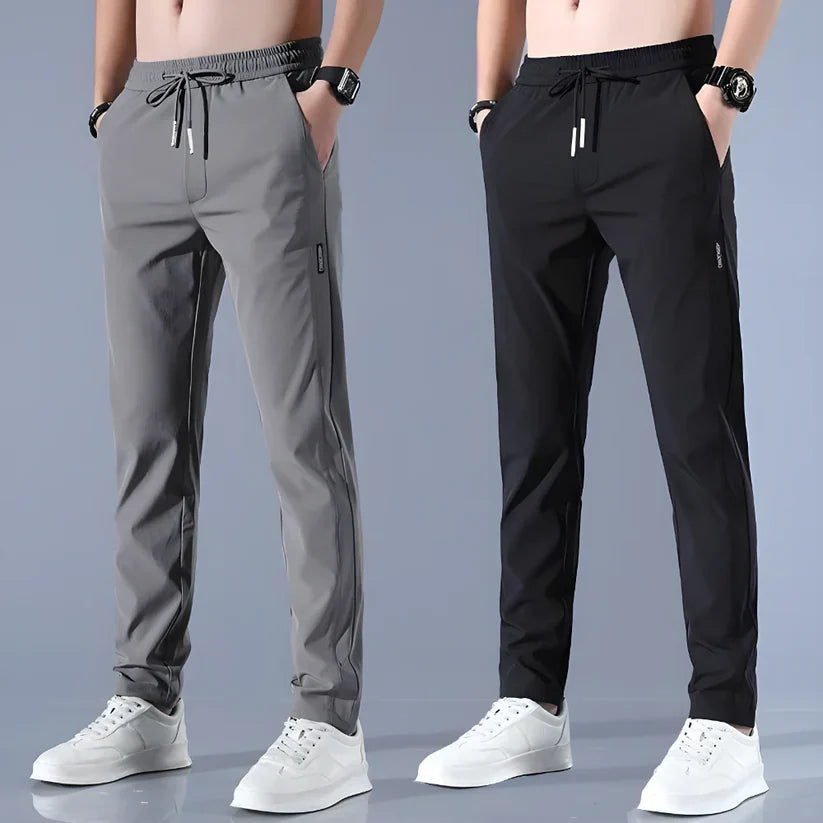 New🔥 Buy 1 Get 1 Free • Premium Men’s High-Stretch Skinny Lycra Track Pants (Black & Grey)