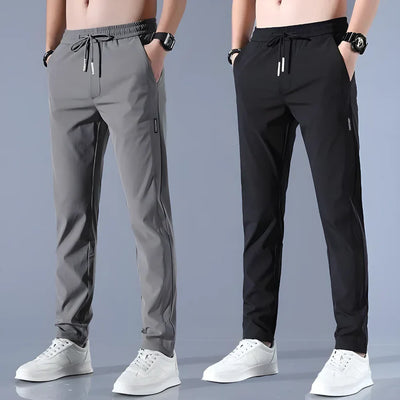 New🔥 Buy 1 Get 1 Free • Premium Men’s High-Stretch Skinny Lycra Track Pants (Black & Grey)